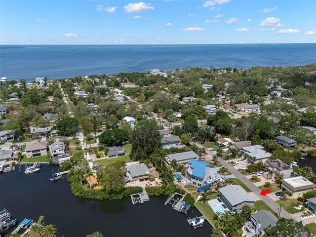 261 Kentucky Ave, Crystal Beach, FL 34681 - aerial perspective of suburban area featuring a nearby body of water