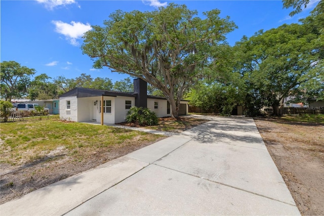 2157 20th Ave SW, Largo, FL 33774 - view of front of property featuring driveway and stucco siding