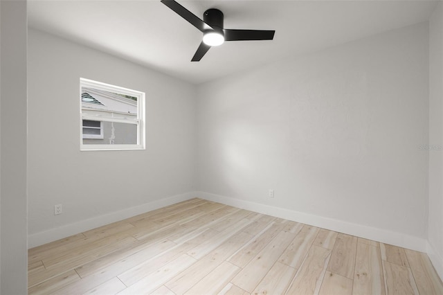 2157 20th Ave SW, Largo, FL 33774 - unfurnished room with a ceiling fan, wood finished floors, and baseboards