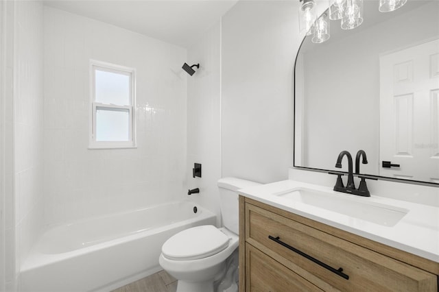 2157 20th Ave SW, Largo, FL 33774 - bathroom featuring vanity, toilet, and  shower combination