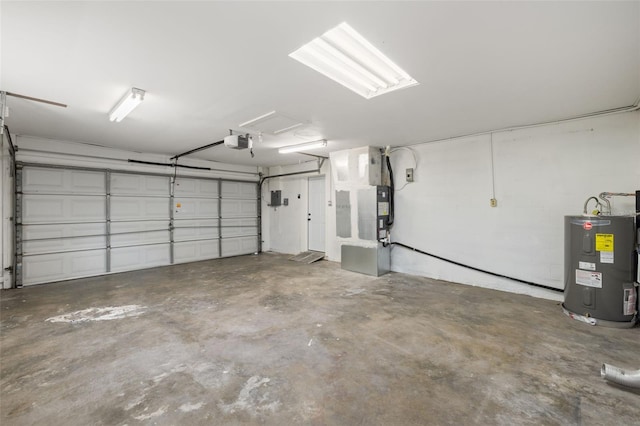 2157 20th Ave SW, Largo, FL 33774 - garage featuring water heater and a garage door opener