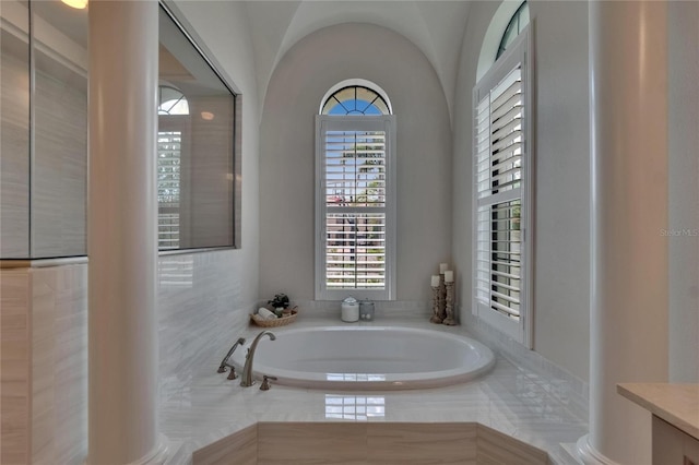 bathroom with a garden tub