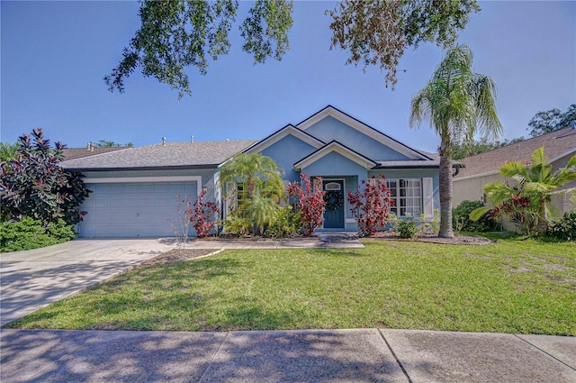 7107 Colonial Lake Dr, Riverview, FL 33578 - ranch-style home with a garage, a front lawn, concrete driveway, and stucco siding