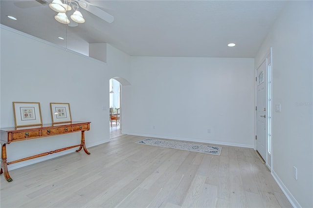 7107 Colonial Lake Dr, Riverview, FL 33578 - foyer featuring arched walkways, ceiling fan, light wood-style flooring, recessed lighting, and baseboards