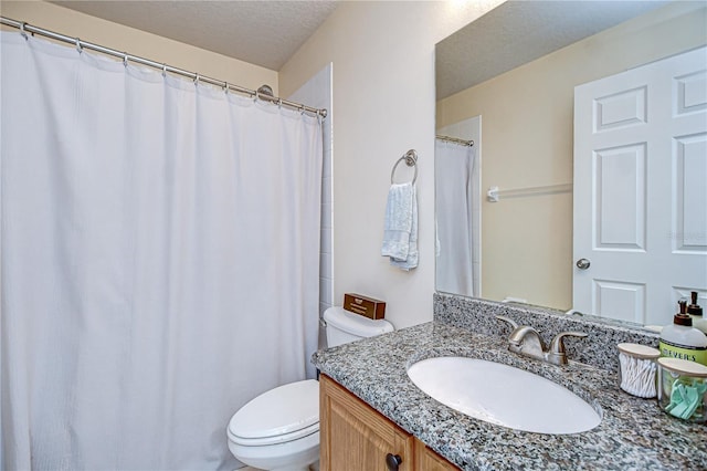 7107 Colonial Lake Dr, Riverview, FL 33578 - bathroom featuring toilet, vanity, and a textured ceiling