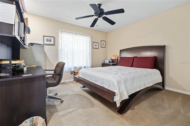 6237 Greenwich Dr, Tampa, FL 33647 - bedroom with carpet flooring, baseboards, a desk, ceiling fan, and a textured ceiling