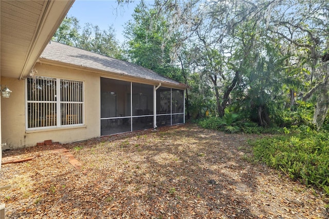 6237 Greenwich Dr, Tampa, FL 33647 - view of yard with a sunroom