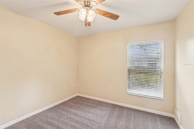 10150 Heather Sound Dr, Tampa, FL 33647 - carpeted spare room with ceiling fan and baseboards