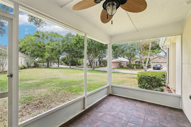10150 Heather Sound Dr, Tampa, FL 33647 - unfurnished sunroom with ceiling fan and plenty of natural light