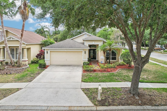 10150 Heather Sound Dr, Tampa, FL 33647 - ranch-style home with a garage, concrete driveway, a front lawn, and roof with shingles