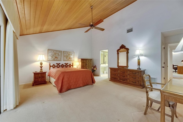 29903 Baywood Ln, Wesley Chapel, FL 33543 - carpeted bedroom featuring wood ceiling, ensuite bath, and high vaulted ceiling