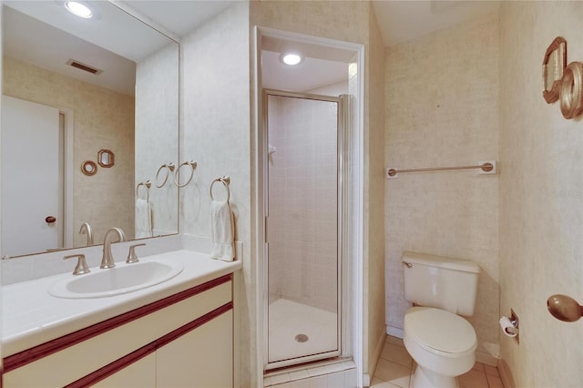 29903 Baywood Ln, Wesley Chapel, FL 33543 - full bath featuring toilet, vanity, a stall shower, and tile patterned floors