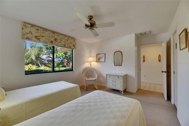 29903 Baywood Ln, Wesley Chapel, FL 33543 - carpeted bedroom with a textured ceiling and a ceiling fan