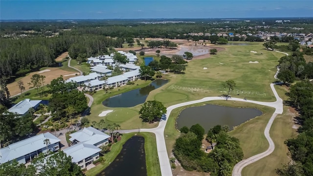 29903 Baywood Ln, Wesley Chapel, FL 33543 - aerial view of property and surrounding area featuring a large body of water, a golf club, and nearby suburban area