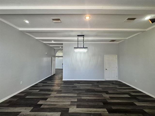 spare room with beam ceiling, dark wood-style flooring, baseboards, and recessed lighting