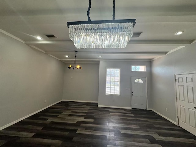 foyer featuring a chandelier, baseboards, wood finished floors, recessed lighting, and crown molding