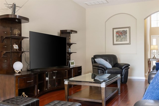 10837 Breaking Rocks Dr, Tampa, FL 33647 - living room featuring dark wood-type flooring and baseboards