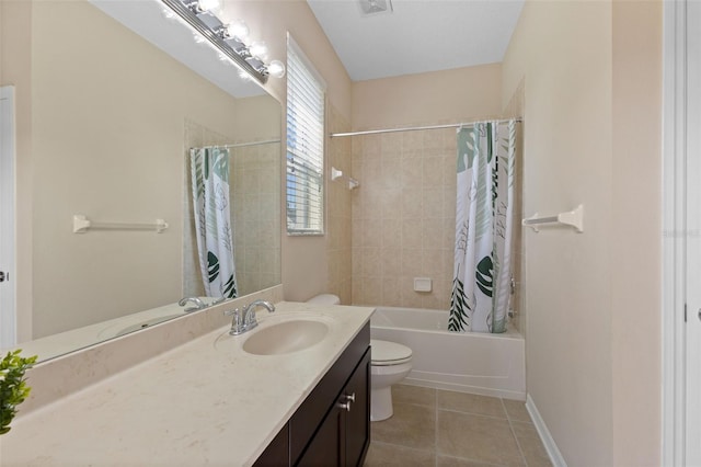 10837 Breaking Rocks Dr, Tampa, FL 33647 - bathroom with tile patterned floors, toilet, vanity, shower / tub combo with curtain, and baseboards