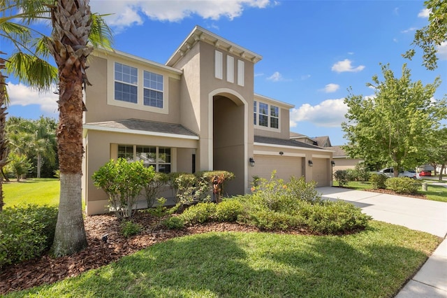 10837 Breaking Rocks Dr, Tampa, FL 33647 - traditional-style house featuring stucco siding, driveway, a front yard, and an attached garage