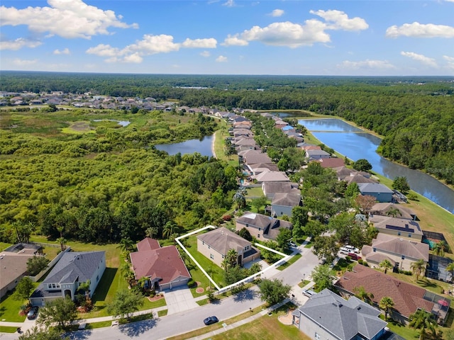 10837 Breaking Rocks Dr, Tampa, FL 33647 - aerial overview of property's location featuring a forest, a nearby body of water, nearby suburban area, and property boundaries highlighted