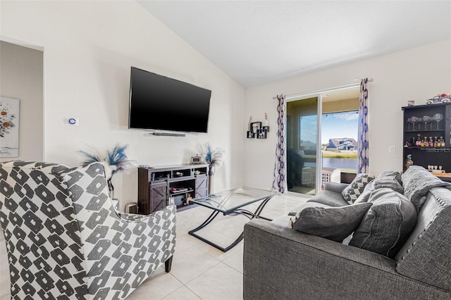11917 Greenchop Pl, Riverview, FL 33579 - living room featuring vaulted ceiling and light tile patterned floors