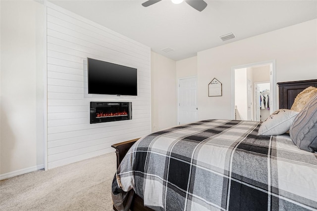 11917 Greenchop Pl, Riverview, FL 33579 - carpeted bedroom featuring a fireplace, ceiling fan, and baseboards