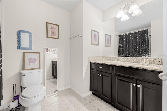 11917 Greenchop Pl, Riverview, FL 33579 - bathroom featuring toilet, vanity, tile patterned floors, and baseboards