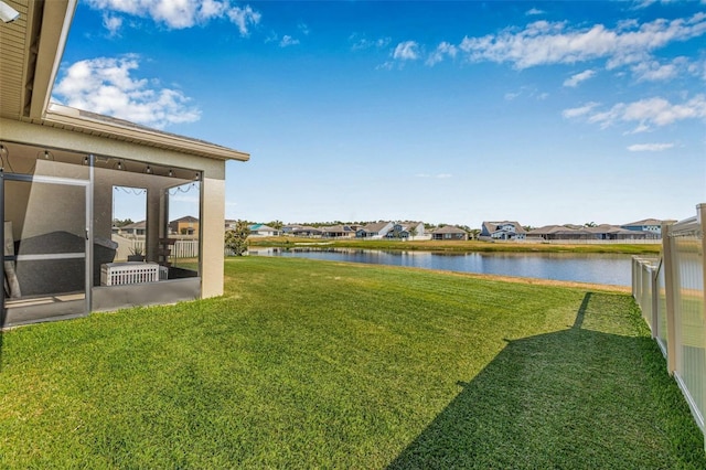 11917 Greenchop Pl, Riverview, FL 33579 - view of green lawn featuring a water view, a residential view, and a sunroom
