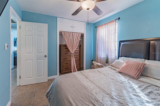 2035 29th Ave N, Saint Petersburg, FL 33713 - bedroom with a closet, light tile patterned floors, and a ceiling fan