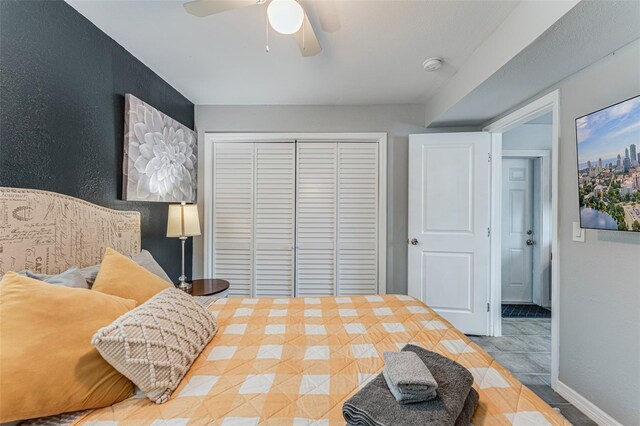 2035 29th Ave N, Saint Petersburg, FL 33713 - bedroom with a closet, ceiling fan, and baseboards
