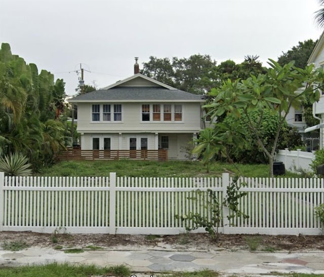 145 20th Ave SE, Saint Petersburg, FL 33705 - view of front of property with a fenced front yard