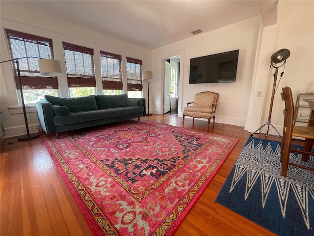 145 20th Ave SE, Saint Petersburg, FL 33705 - living area with wood finished floors and baseboards
