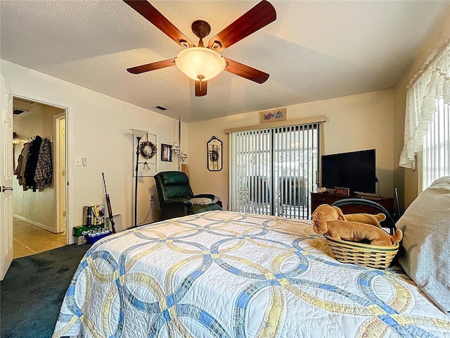 3544 Porter Rd, Lithia, FL 33547 - bedroom featuring a textured ceiling, access to outside, a ceiling fan, and carpet