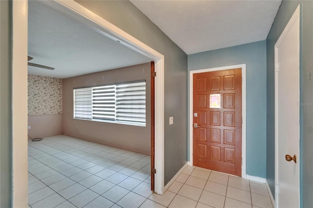 508 E Brentridge, Brandon, FL 33511 - foyer featuring light tile patterned flooring, baseboards, and a ceiling fan