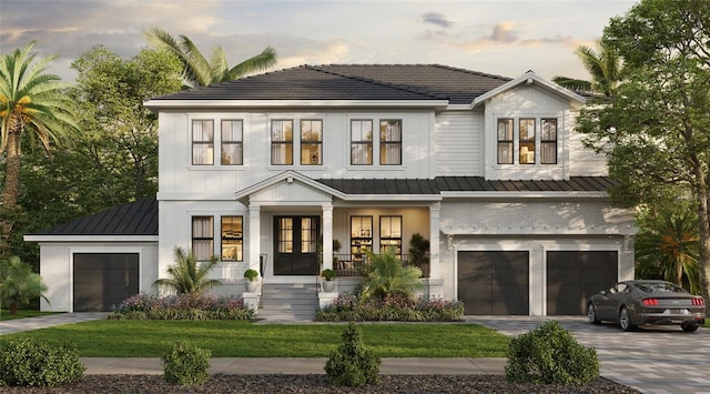 modern farmhouse style home featuring brick siding, a garage, a porch, a lawn, and driveway