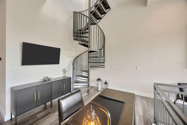 4047 Gauge Line Loop, Tampa, FL 33624 - dining room with wood finished floors, stairs, and baseboards