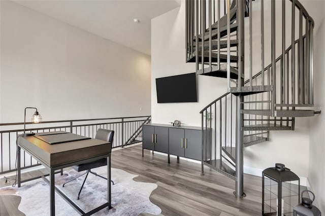 4047 Gauge Line Loop, Tampa, FL 33624 - office space featuring wood finished floors and a towering ceiling