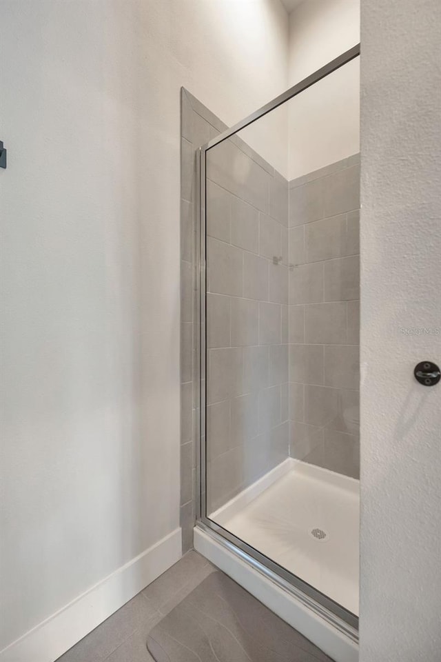 4047 Gauge Line Loop, Tampa, FL 33624 - full bath with a shower stall and tile patterned floors