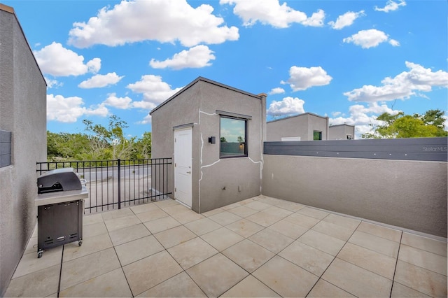 4047 Gauge Line Loop, Tampa, FL 33624 - view of patio with grilling area and a balcony