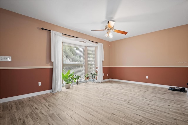 3413 W Kirby St, Tampa, FL 33614 - spare room with ceiling fan, wood finished floors, and baseboards