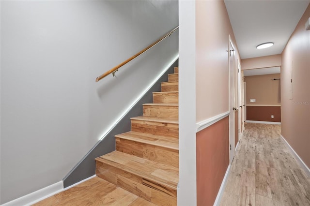 3413 W Kirby St, Tampa, FL 33614 - staircase featuring wood finished floors and baseboards
