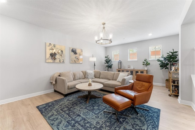 412 S Albany Ave Unit 2, Tampa, FL 33606 - living area with light wood-style floors, a chandelier, baseboards, and recessed lighting