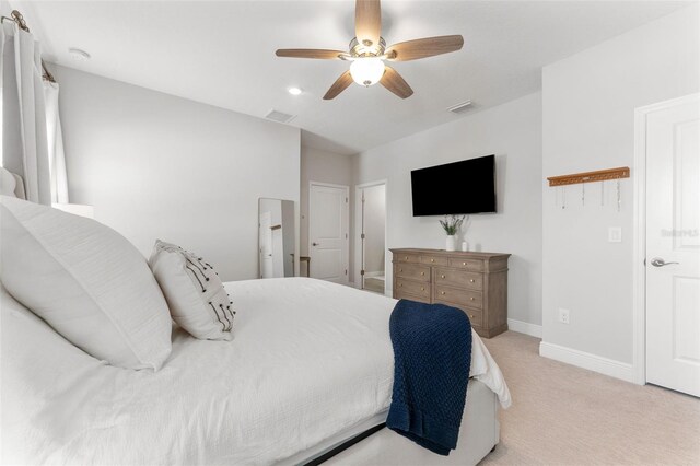 412 S Albany Ave Unit 2, Tampa, FL 33606 - bedroom with light carpet, baseboards, and ceiling fan