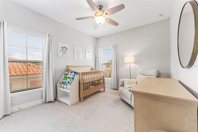 412 S Albany Ave Unit 2, Tampa, FL 33606 - bedroom with light colored carpet, baseboards, and ceiling fan