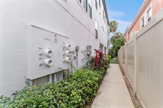 412 S Albany Ave Unit 2, Tampa, FL 33606 - view of home's exterior featuring stucco siding and fence