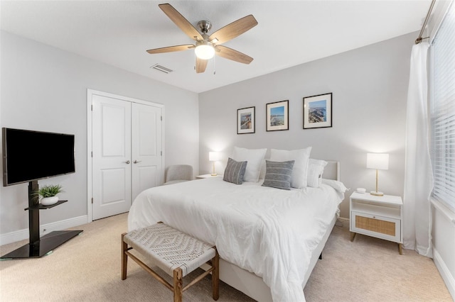 412 S Albany Ave Unit 2, Tampa, FL 33606 - bedroom featuring light colored carpet, baseboards, a closet, and a ceiling fan