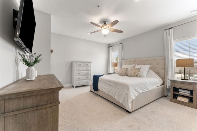 412 S Albany Ave Unit 2, Tampa, FL 33606 - bedroom with light carpet and a ceiling fan