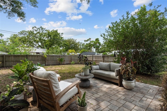view of patio / terrace with an outdoor hangout area and a fenced backyard