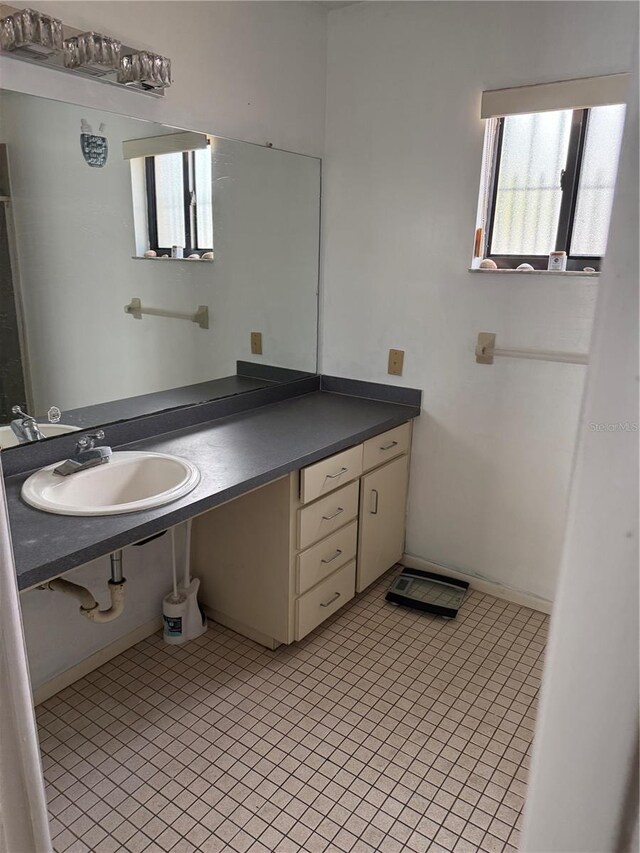 2026 Aaron Pl, Clearwater, FL 33760 - bathroom featuring a sink and tile patterned floors