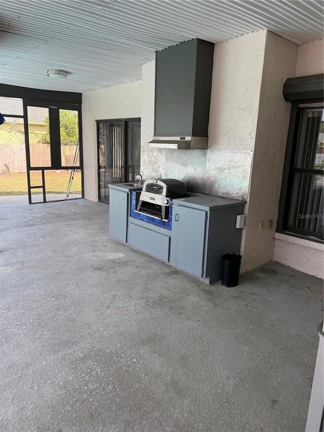 2026 Aaron Pl, Clearwater, FL 33760 - view of patio featuring area for grilling, fence, and a sink